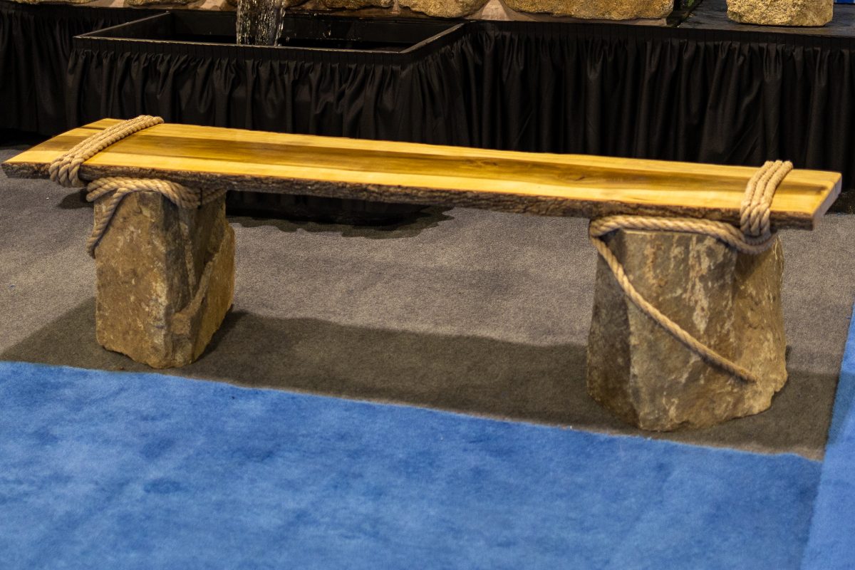 A stand alone classic natural stone bench